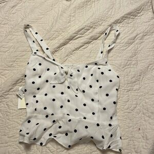 White and black polkadot crop top from Wilfred.